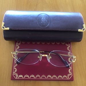 Cartier gold logo C eyeglasses.